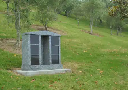 Example of stone columbarium with six ash burial shelves at cemetery on Auckland’s North Shore